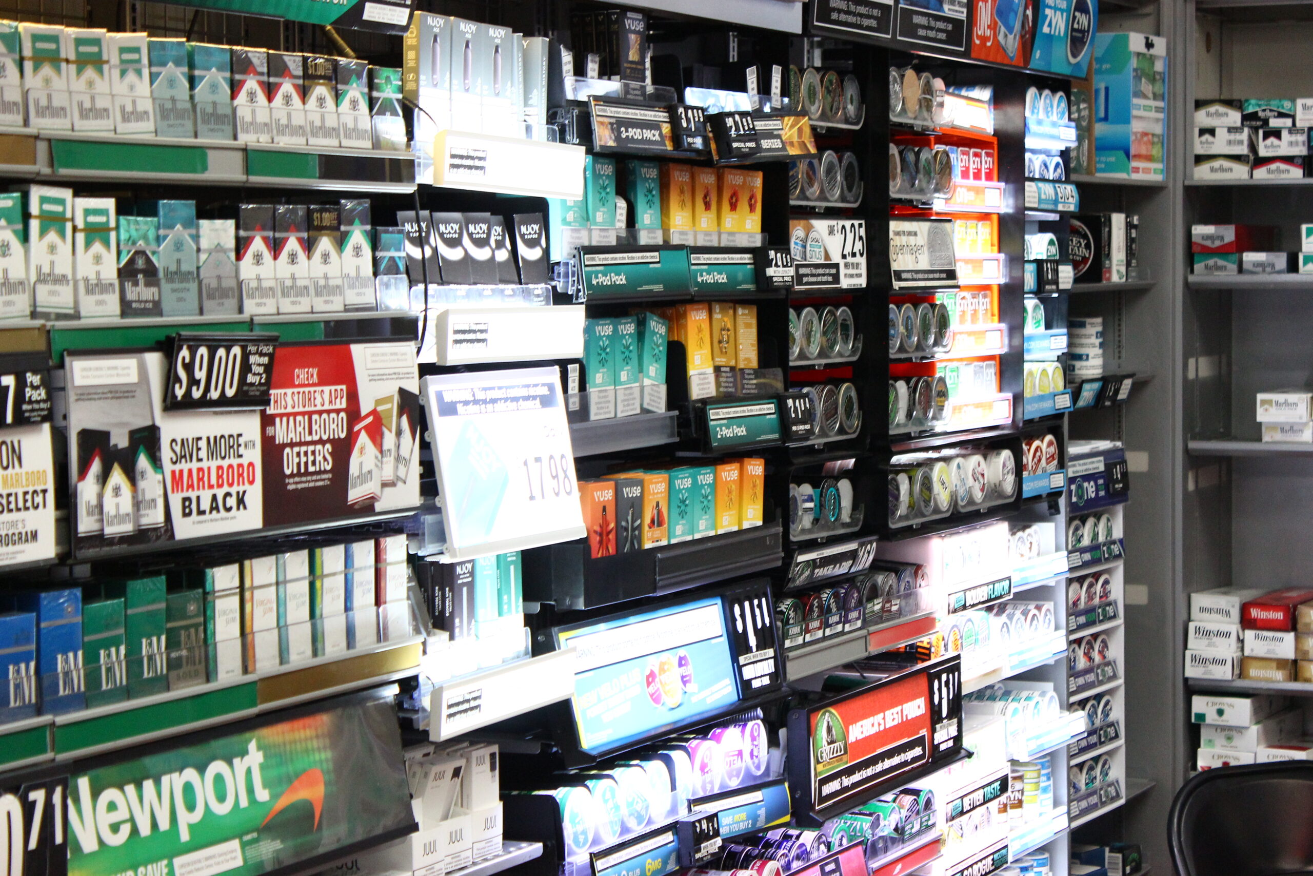 Image of Items in Aisle at Smokers Outlet Retail Store